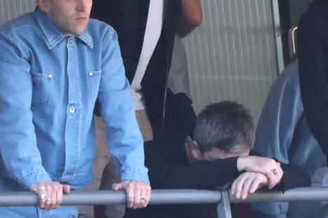 Oasis’ Noel Gallagher looks miserable as he watches Man City lose with daughter Anais and her famous boyfriend