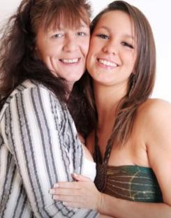 Photo of a mother and daughter embracing.