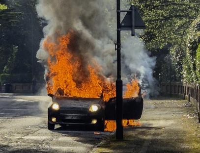Moment car EXPLODES into 15ft fireball seconds after driver stepped out in seaside hotspot