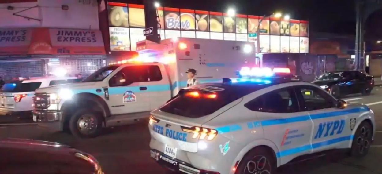 NYPD vehicles at a hit-and-run scene.