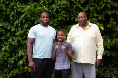 Boxer Daniel Dubois with his father and brother.