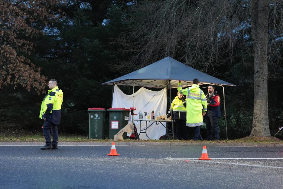 Police officers at a crime scene.