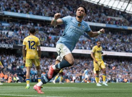 MANCHESTER, ENGLAND - APRIL 12: Omar Marmoush of Manchester City celebrates scoring the second goal during the Premier League match between Manchester City FC and Crystal Palace FC at Etihad Stadium on April 12, 2025 in Manchester, England. (Photo by Visionhaus/Getty Images)