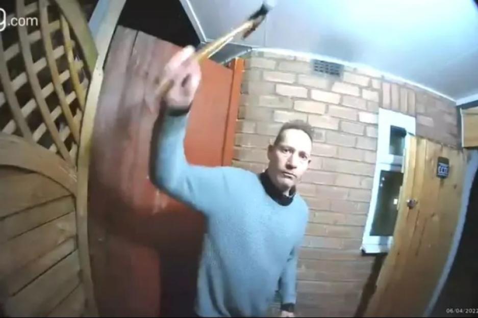 ‘Neighbour from hell’ who attacked home with a hammer & harassed disabled man is STILL living on same street years later