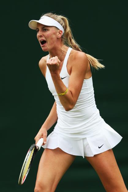 Naomi Broady of Great Britain celebrating during a tennis match.