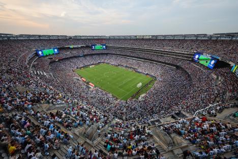 A full stadium during a soccer match.