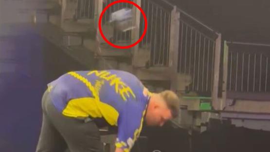 Luke Littler narrowly avoids being hit by object thrown at him while on O2 stage during Premier League Darts finals