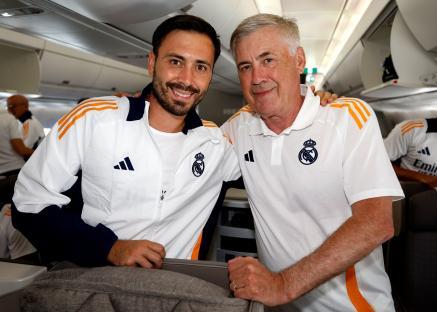 Davide Ancelotti and Carlo Ancelotti, Real Madrid's assistant and head coaches, on a plane.