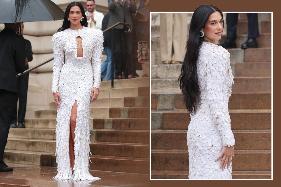 Dua Lipa shows off stunning figure in feathered gown with revealing keyhole cutout