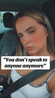 Woman in a car, caption: