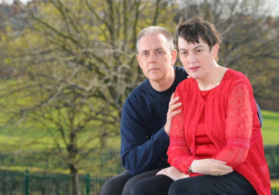 Glenys Gosden and her husband Kevin, parents of missing son Andrew, sit outdoors.