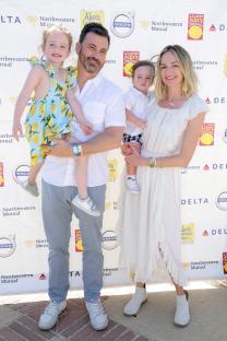 Jimmy Kimmel, his wife Molly McNearney, and their two children at an event.