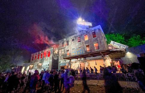 Crowd waiting in line to enter the NYC Download nightclub at Glastonbury Festival.
