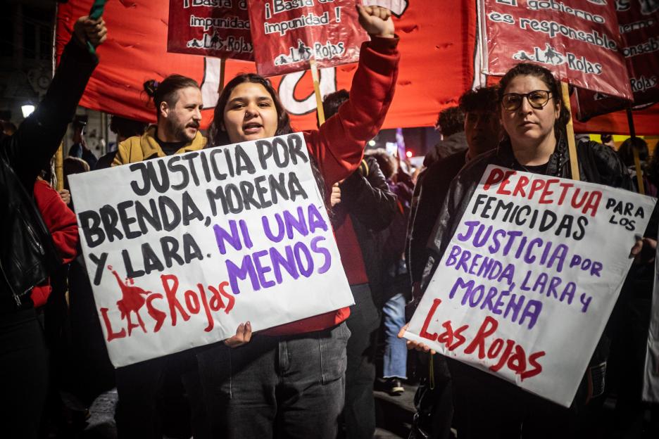 Protesters holding signs that read "Justice for Brenda, Morena and Lara" and "Perpetua femicidas, justice for Brenda, Lara and Morena".