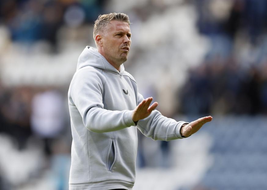 Rob Edwards, Middlesbrough head coach, reacting to fans.