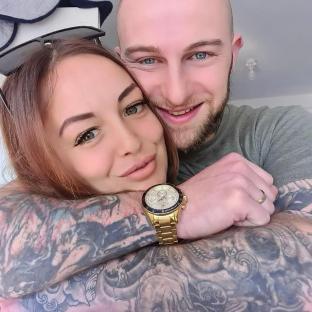 Photo of a couple embracing.