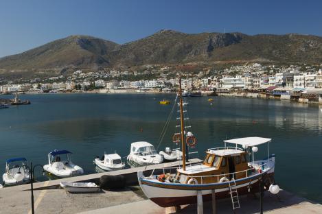 Aerial view of Heraklion, Crete, showing the city, harbor, and coastline.