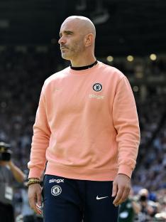 Enzo Maresca, Chelsea manager, at a Premier League match.