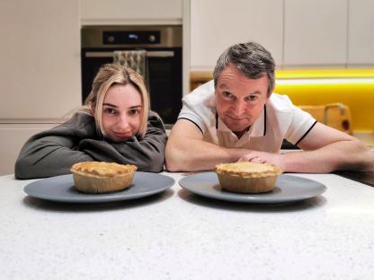 Noel and Chloe with their pies.