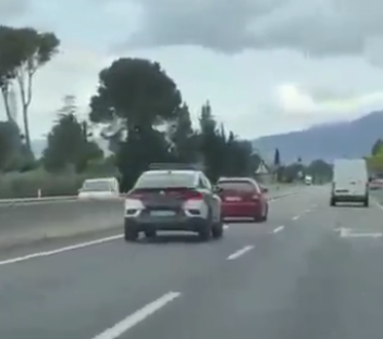 Cars driving on a highway.