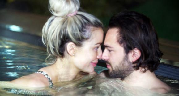 Olivia Attwood and Bradley Dack in a hot tub.