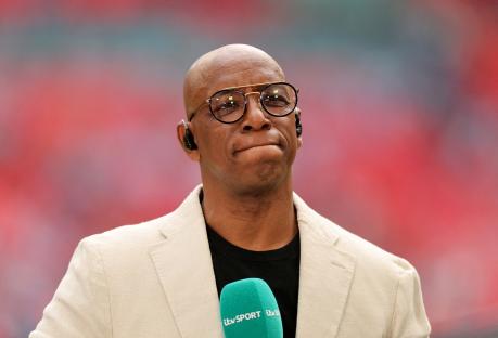 Ian Wright, former soccer player and TV pundit, at a stadium.