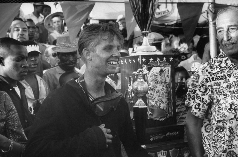 Bobby Allen, the winner of the kart race, holding a trophy.