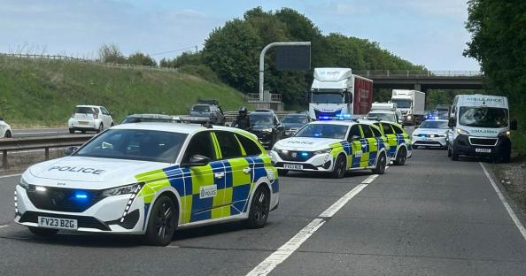 Four-car crash sparks tailbacks on busy motorway as cops warn ‘please avoid the area’