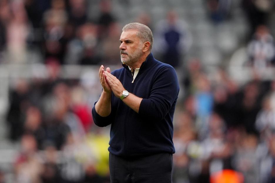 Nottingham Forest manager Ange Postecoglou applauds the fans.