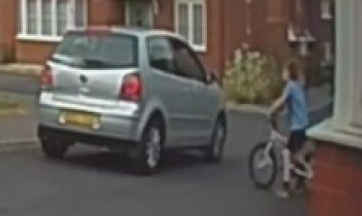 Ring doorbell camera footage showing a residential street.