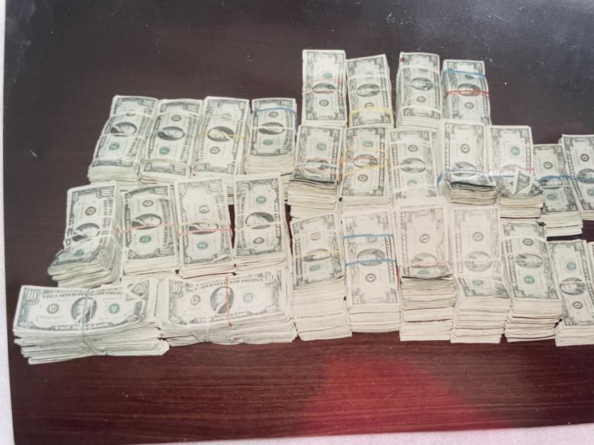 Bundles of $10 and $20 dollar bills.