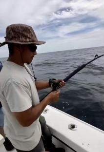 Man fishing on a boat.