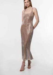Model wearing a sequined midi dress.