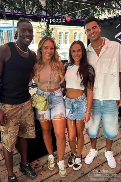 Group photo of four people.