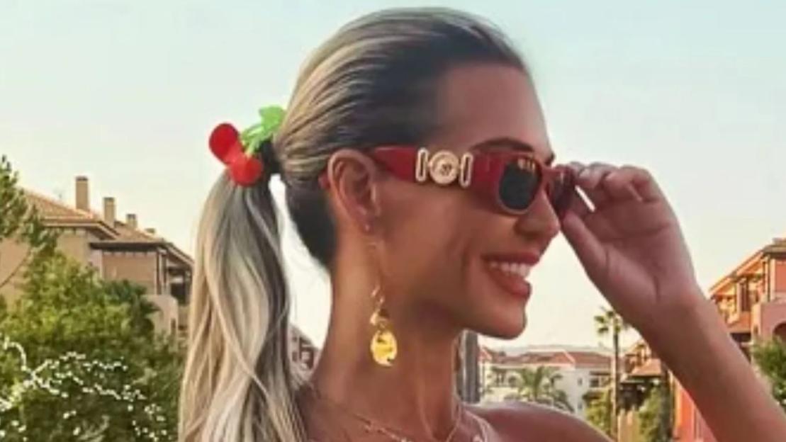 Christine McGuinness shows off her tan as she goes braless and wears tiny hotpants on holiday with ex Paddy
