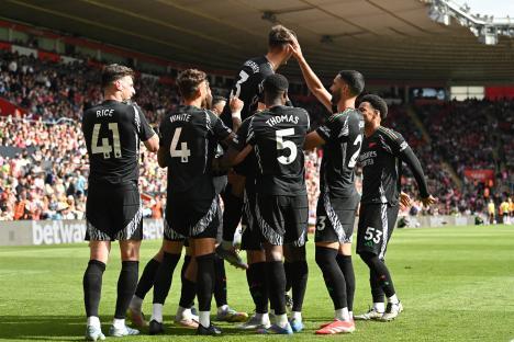 Arsenal players celebrating a goal.