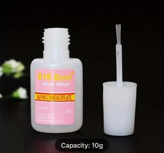 BYB Bond nail glue bottle and applicator.