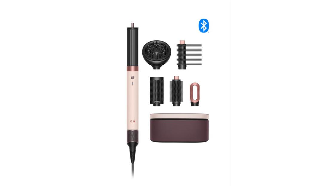 Dyson Airwrap styler and dryer with attachments and case.