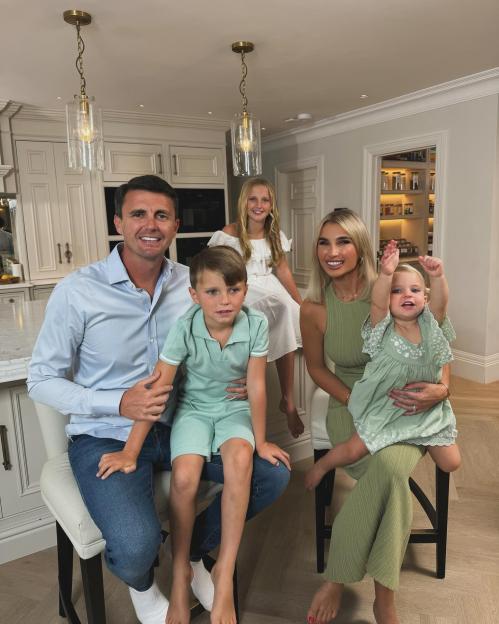 Billie Faiers with her family in their kitchen.