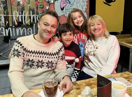 A terminally ill father with his family.
