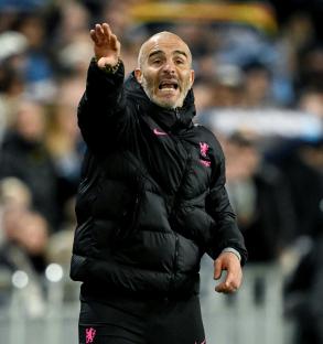 Chelsea manager Enzo Maresca coaching during a soccer match.