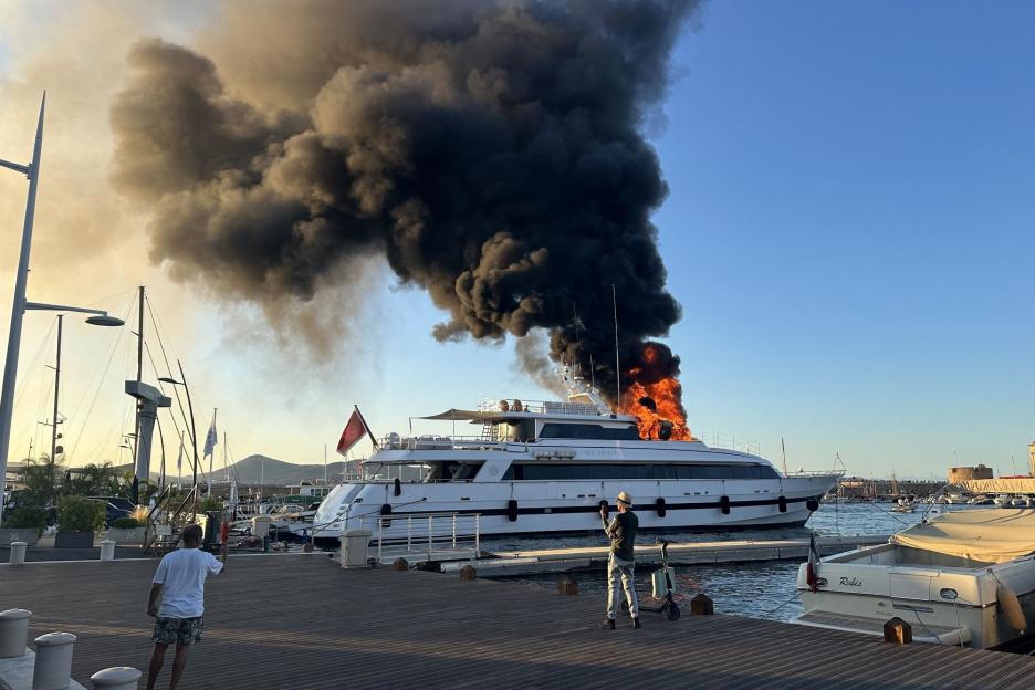 Luxury £80m Brit superyacht bursts into flames in exclusive hols resort as crew members rescued from raging blaze