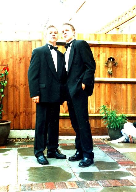 Olly Murs and his twin brother dressed as DJs at a party.