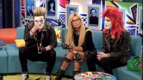 Jedward and Nicola McLean on a TV show sofa.