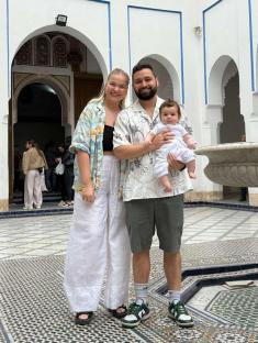Couple and baby on holiday in Morocco.
