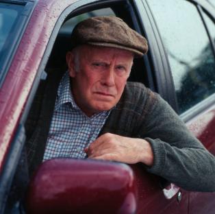 Richard Wilson as Victor Meldrew in a car.