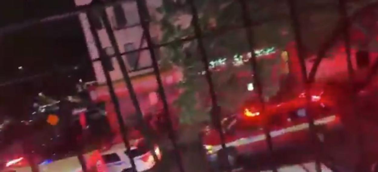 Emergency responders at a Brooklyn shooting scene.