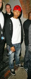 Pharrell Williams leaving a nightclub.