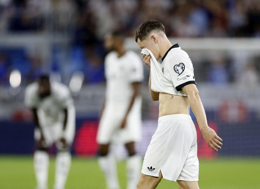 Florian Wirtz looking dejected after a soccer match.