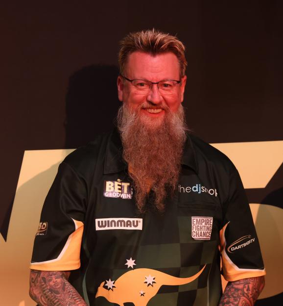 Simon Whitlock during the World Senior Darts, Champion of Champions tournament at Modus Live Lounge, Portsmouth, United Kingdom on 29 June 2025.